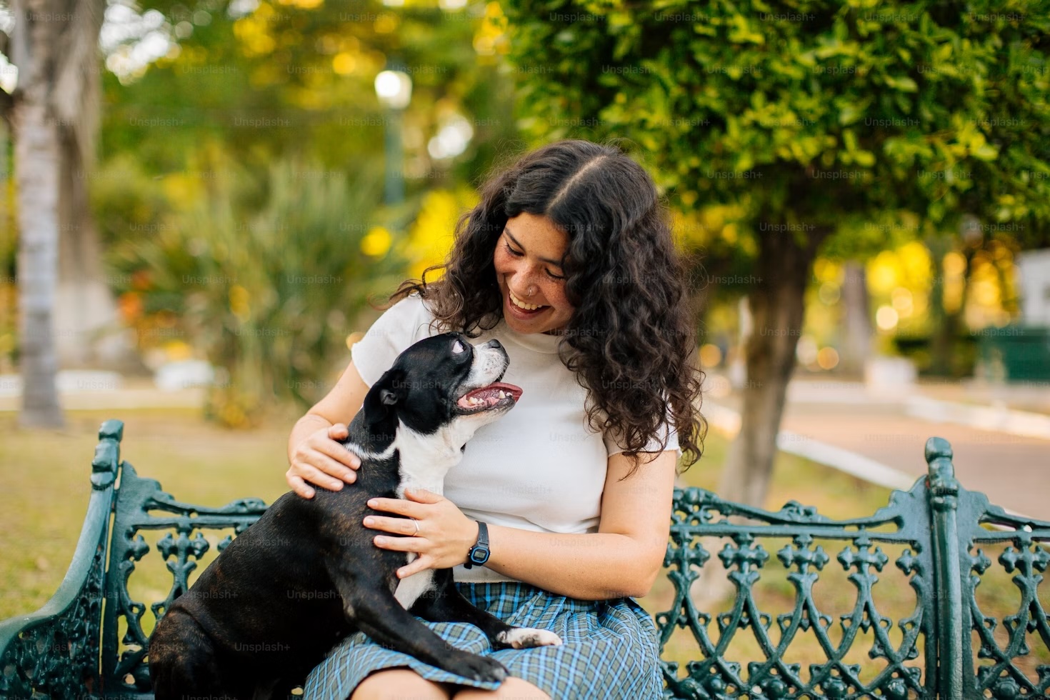 Owner and Pet on bench 